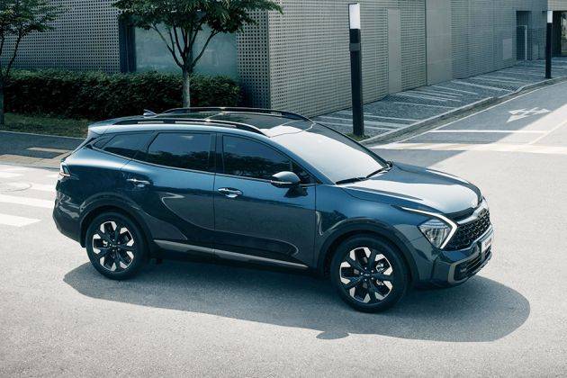  Se revela el SUV Kia Sportage de quinta generación, comparte los fundamentos con el nuevo Hyundai Tucson |  CarDekho.com