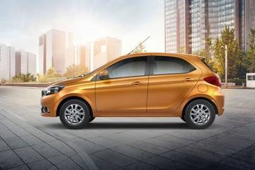 Tata Tiago 2015-2019 The Tata Tiago gets a more contemporary looking side profile as opposed to the egg-shaped oneseenon the Indica. The roofline doesnâ??t have any sharp curves,thanks to which it doesnâ??t look bloated likethe Indica.