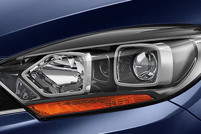 Tata Tigor 2017-2020 The headlamps have been updated to include a sharper twin-pod layout. The XZA and XZ+ variants come with dual chambered projector headlamps with chrome finish, while lower trims get three dimensional headlamps with conventional halogen bulbs. There are no LED daytime running lights (DRLs) on offer with any variant.
