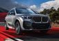 BMW X1 LWB Driving: Front Right Quarter View BMW X1 LWB Driving: Front Right Quarter View