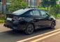 Honda City Driving: Rear Right Three Quarter View Honda City Driving: Rear Right Three Quarter View