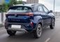 Tata Nexon Driving: Rear Right Three Quarter View Tata Nexon Driving: Rear Right Three Quarter View