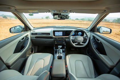 https://stimg.cardekho.com/images/carinteriorimages/930x620/Hyundai/Creta/8667/1751535903895/dashboard-59.jpg?impolicy=resize&imwidth=420