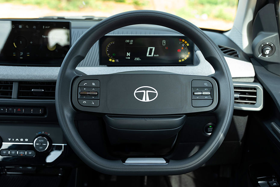 Tata Tiago The two-spoke steering wheel carries audio phone and cruise control buttons