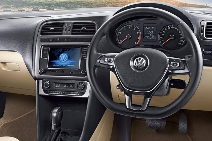 Volkswagen Vento 2015-2019 The three-spoke, flat bottom steering wheel looks and feel good to hold. Except the base-spec Trendline trim, all higher variants come with leather wrapped steering with piano black and chrome accents.