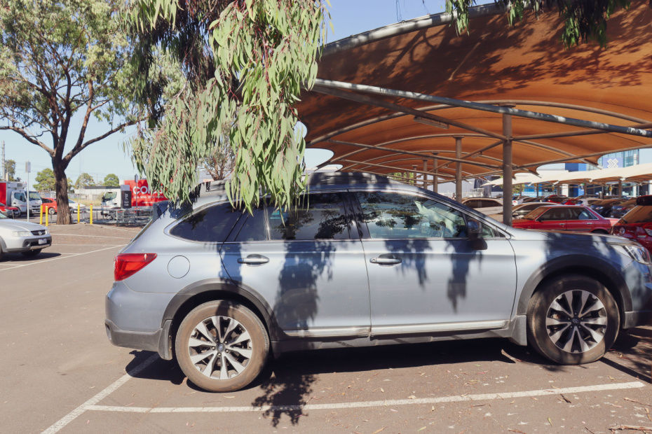 Car parked in a shade