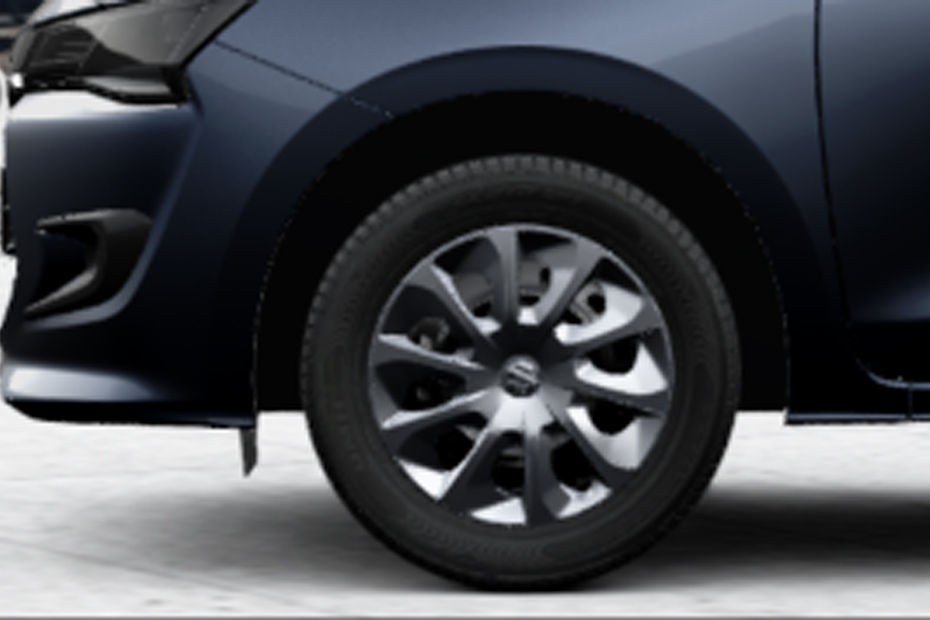 Maruti Dzire VXi variant gets steel wheels with covers Maruti Dzire VXi variant gets steel wheels with covers