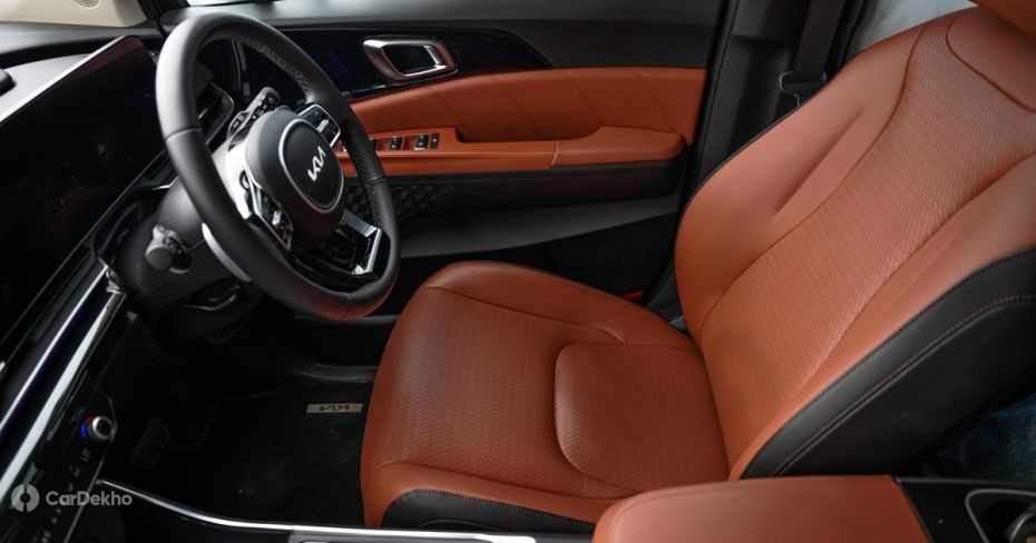 Kia Carnival tan leathrette seats