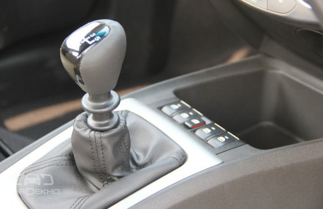 Sail's gearshift has short throws but is not as refined as Honda's; power windows switch location not convenient Sail's gearshift has short throws but is not as refined as Honda's; power windows switch location not convenient