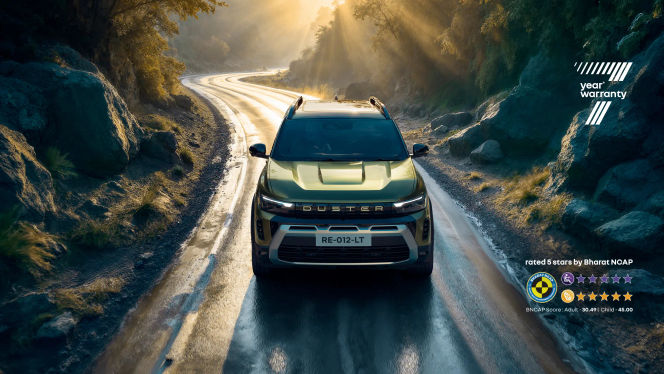 Renault Duster in green driving on a forest road with Bharat NCAP badge Renault Duster in green driving on a forest road with Bharat NCAP badge