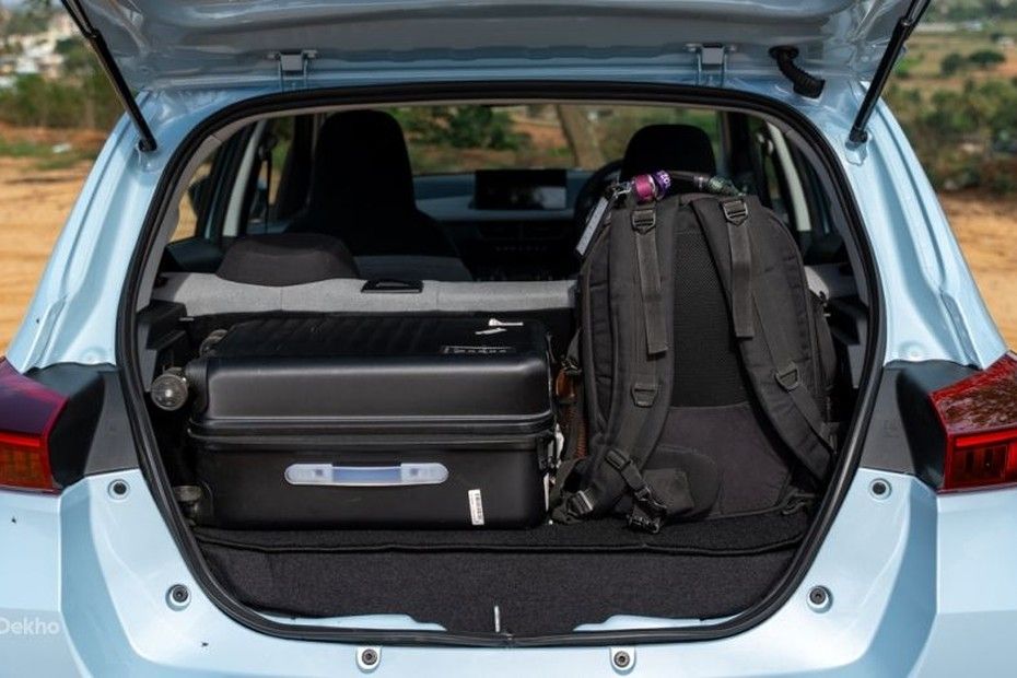Tata Tiago CNG boot holding a cabin suitcase and a backpack