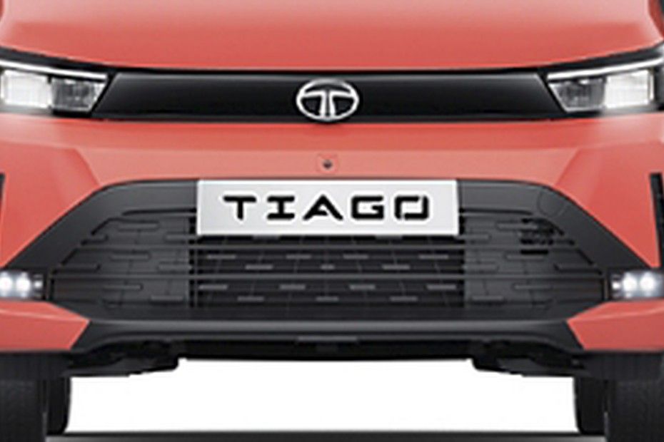 Tata Tiago front end in orange-red with wide lower grille and fog lamps