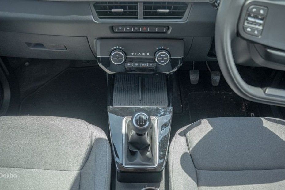 Tata Tiago centre console with manual gear lever, phone deck and climate control dials