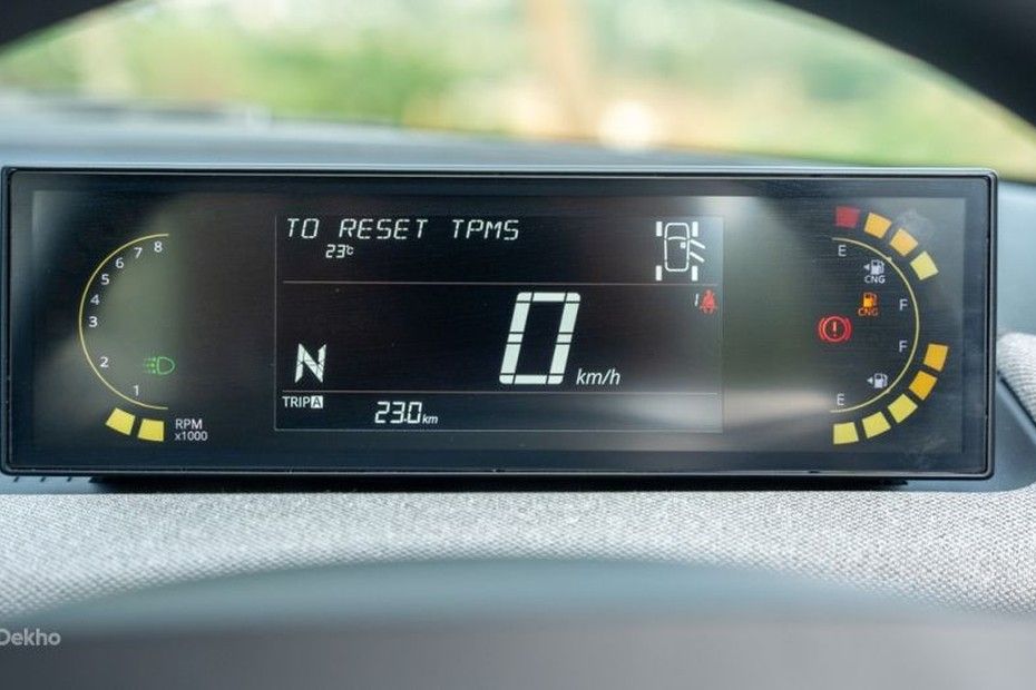 Tata Tiago digital instrument cluster showing speed, gear, trip and twin fuel gauges