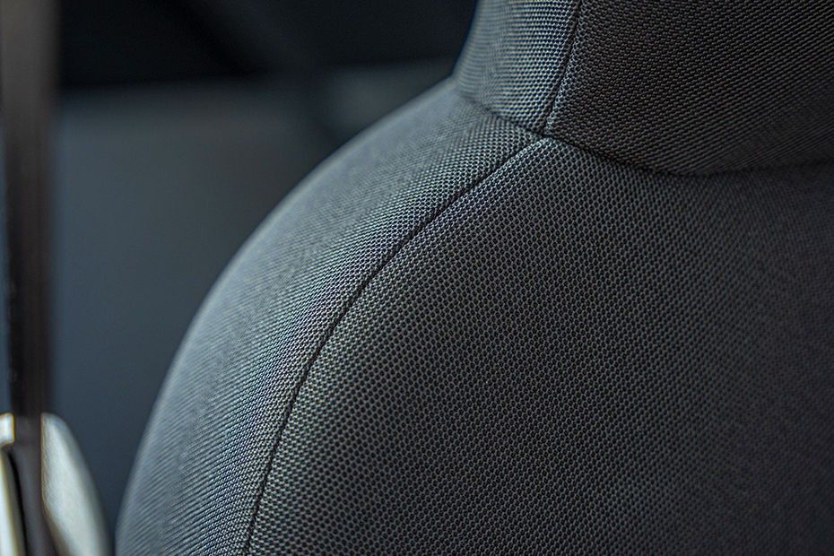 Tata Tiago dark grey melange fabric seat and headrest close-up