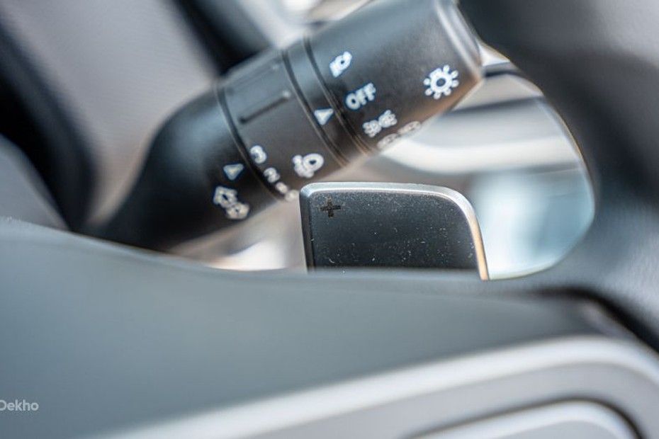 Tata Tiago steering-mounted paddle shifter with plus sign behind the wiper stalk
