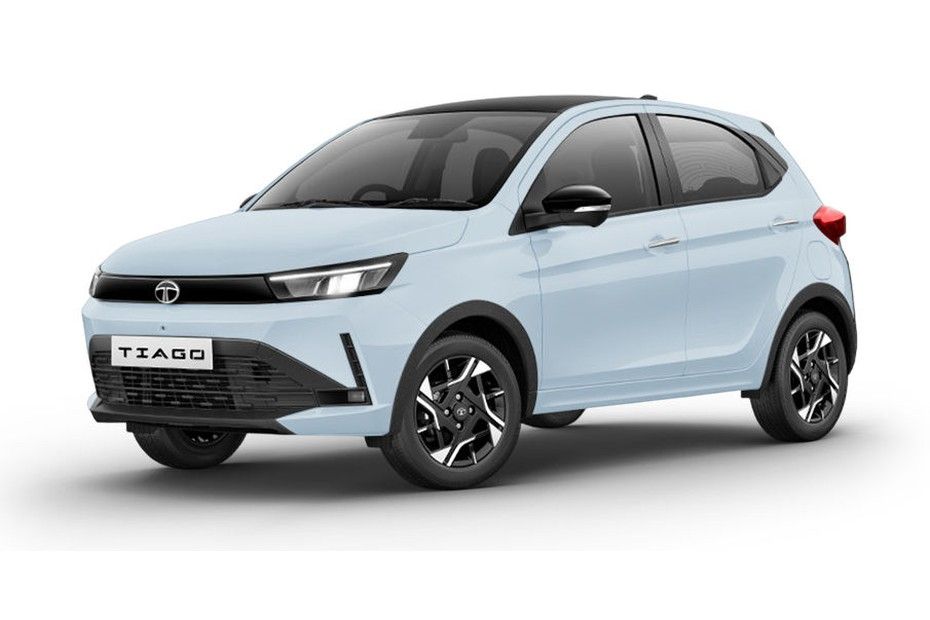 Tata Tiago in pale blue Pangong Pulse with black roof, front three-quarter view