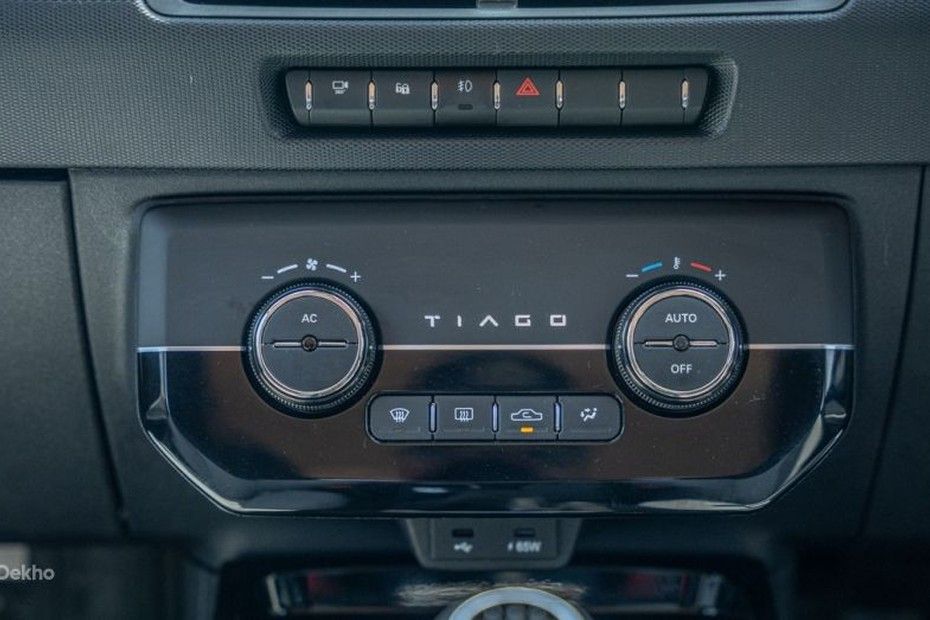 Tata Tiago climate control panel with two rotary knobs and buttons