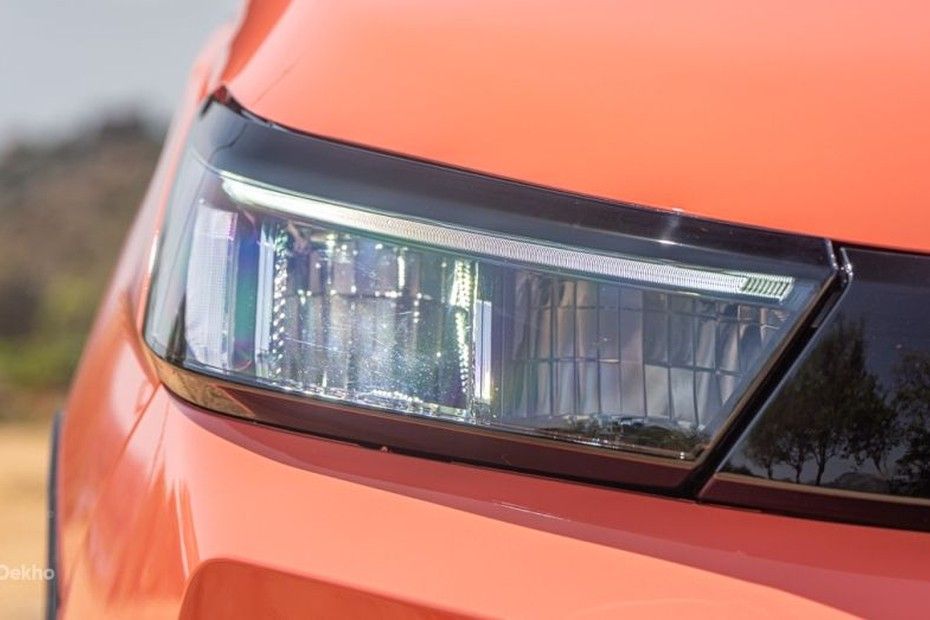 Tata Tiago LED headlamp with eyebrow LED DRL on orange body