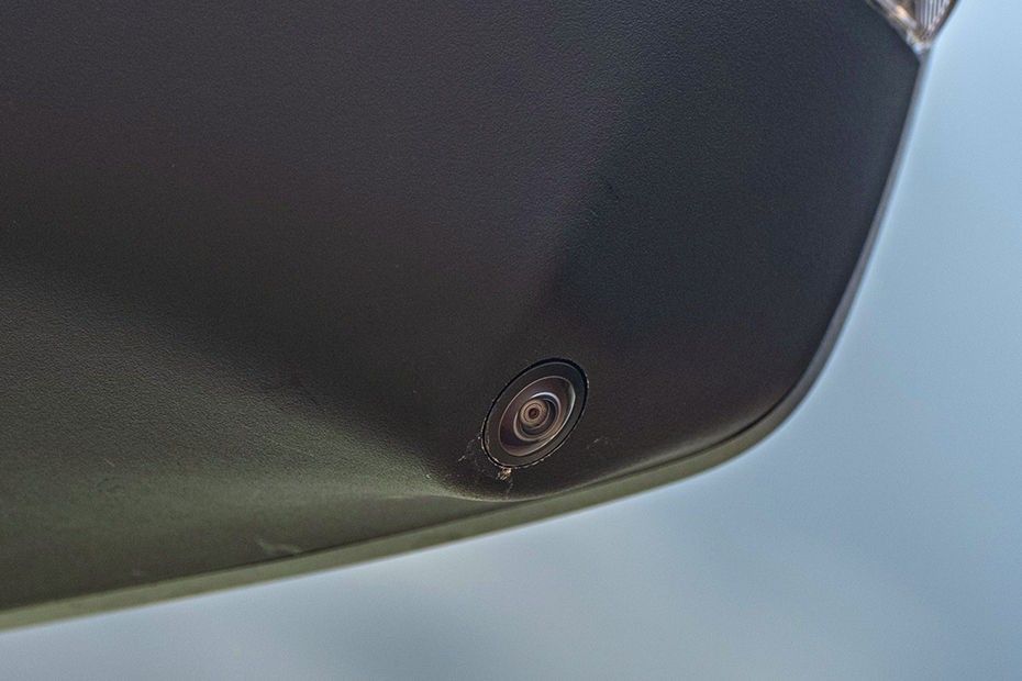 Tata Tiago camera lens mounted under the left side mirror housing