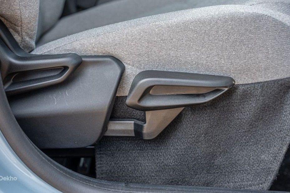 Tata Tiago driver seat side showing manual recline and height adjustment levers