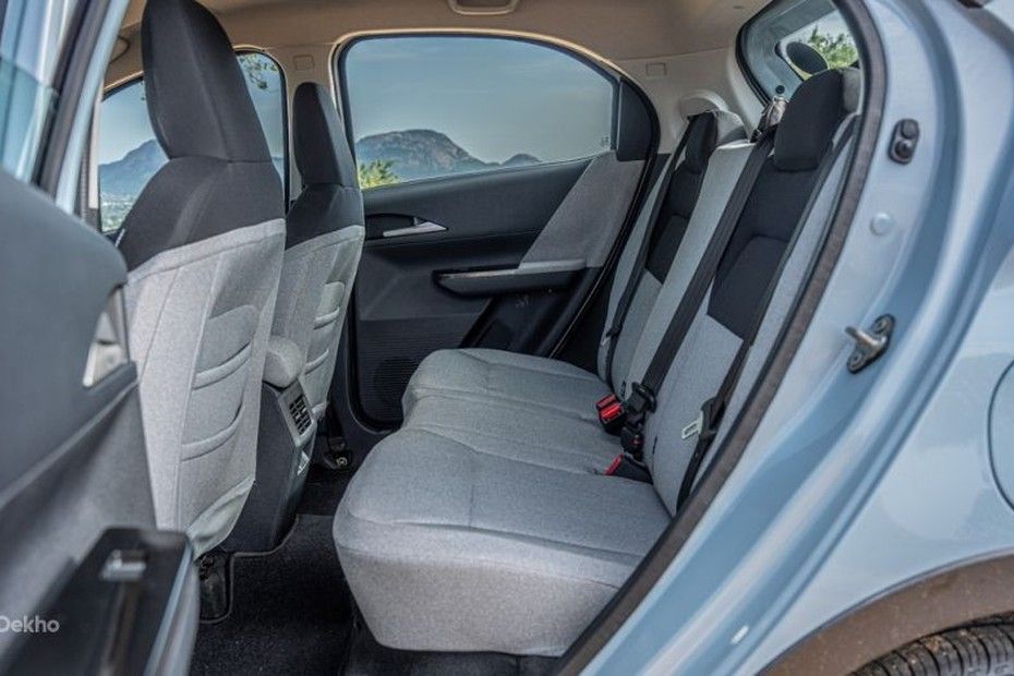 Tata Tiago rear bench seat in grey fabric seen through open rear door