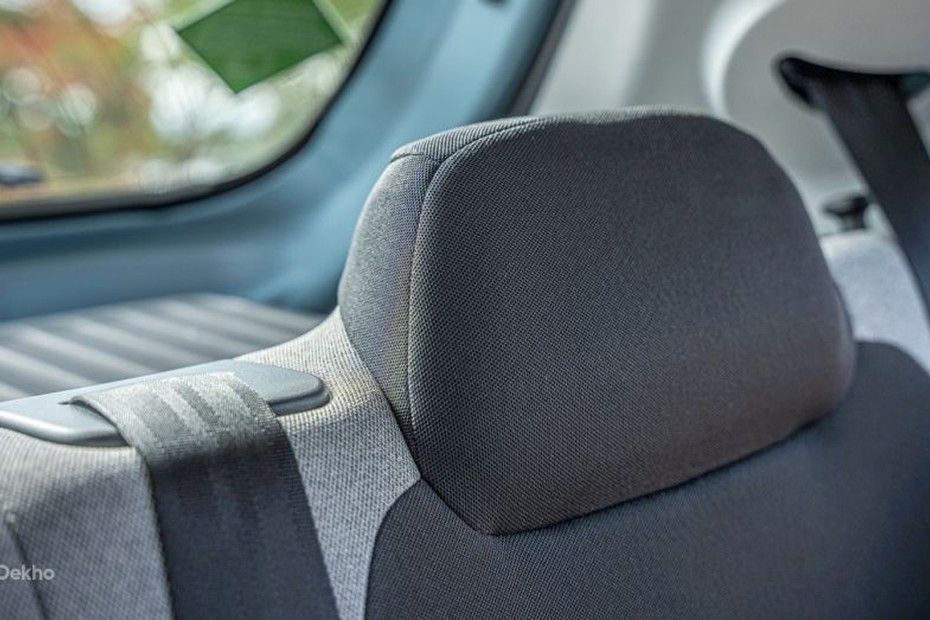Tata Tiago rear seat with small fixed fabric headrest and seatbelt