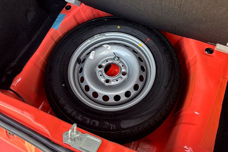 Tata Tiago steel spare wheel stored in the well under the boot floor