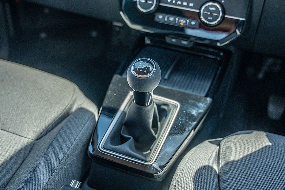 Tata Tiago 5-speed manual gear lever on gloss black centre console